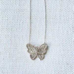 Roberto Coin Diamond Butterfly Pendent Necklace with sterling silver chain.
